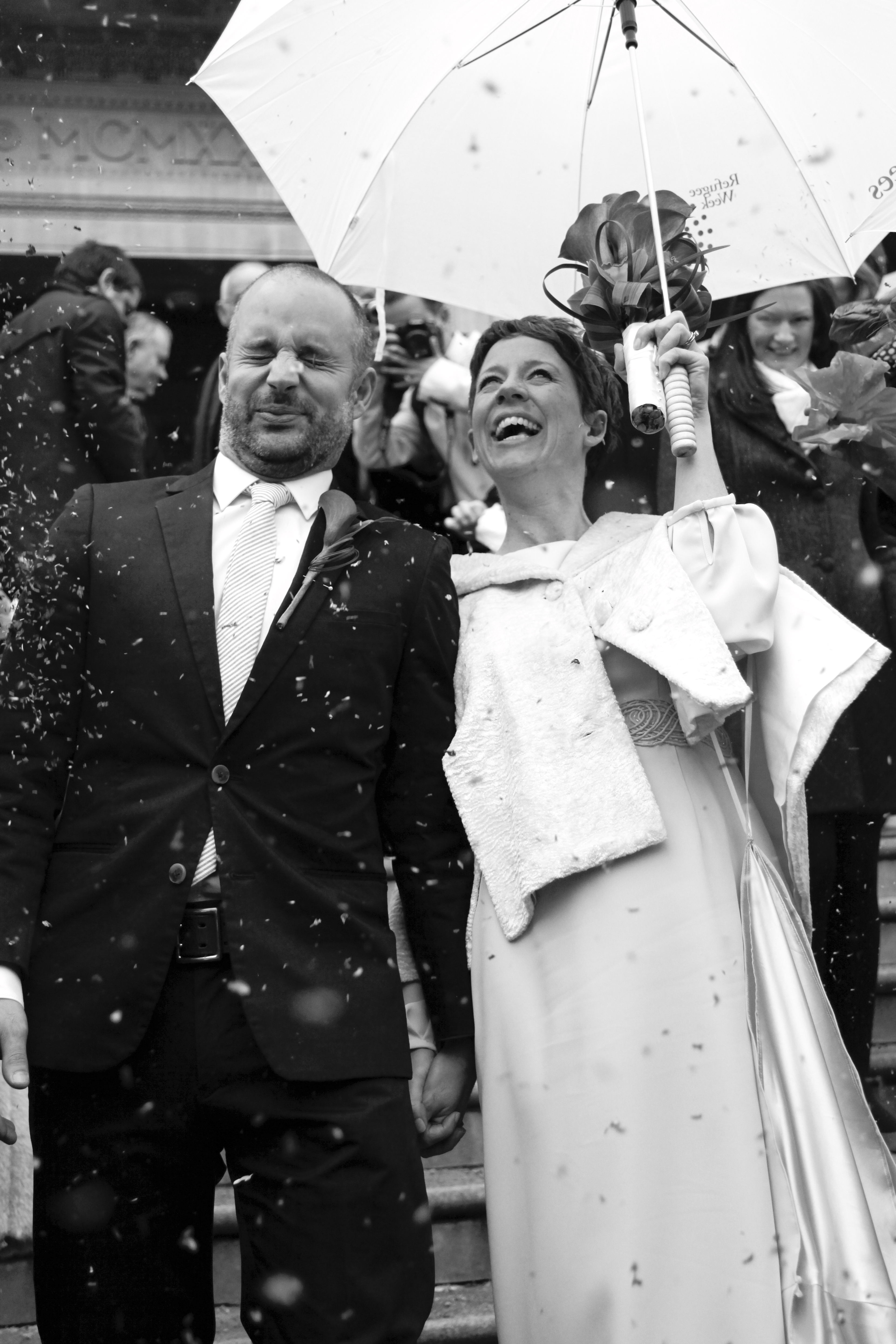 Confetti in the rain Wedding Photography