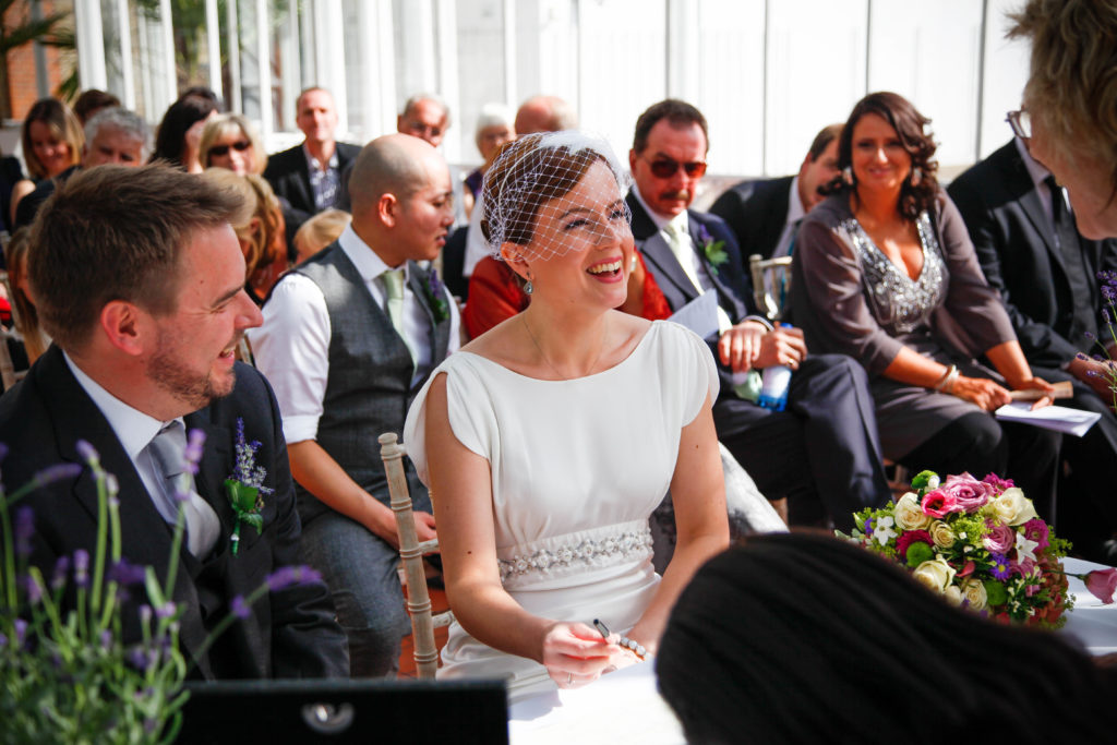 Bride signing the register