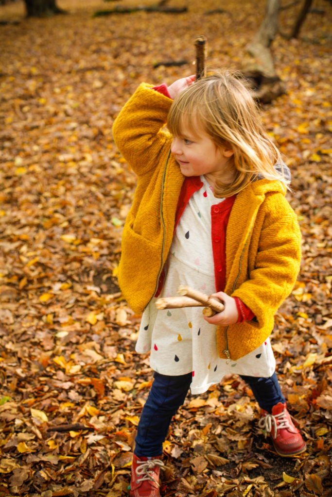 autumn girl in the woods